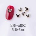 Vista detallada de dijes de mariposa para uñas en negro y oro con medidas exactas - Estilo De Mariposa Pequeña Con Borde Dorado Negro (AB02)