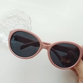 Lotus pink oval frame sunglasses for kids with black UV400 lenses in a vintage style - Pinkish Grey