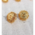 2CM Round golden stud earrings with radial texture finish shown in detail - Stud Earrings