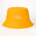 Detailed close-up of yellow bucket hat with white Good Vibes embroidery and stitching - M / Yellow