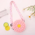 Detail of flower silicone pop bag with adjustable daisy pattern shoulder strap - Pink