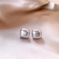 Elegant square silver earrings with matte texture on soft silk fabric background - Gray Square Pearl