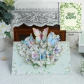 3D butterfly pop-up greeting card with colorful paper carvings and Best Wishes text - Flying Butterflies and Magnolias
