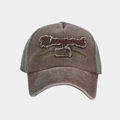 Close-up of vintage washed denim baseball cap with Newyork embroidery and distressed details - Adjustable / Coffee