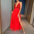 Detail of red sequined bodice with deep V-neck and mesh high-slit skirt on long dress - XS / Red