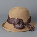 Detail of hand-woven straw cloche hat with an elegant twisted silk band decoration - M (56-58cm) / Khaki