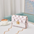 Mini floral printed crossbody bag in cream white with a chic gold chain strap - White