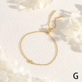 Detail of adjustable gold toggle bracelet with a round sparkling cubic zirconia - Gold With Round Clear Zirconia