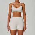 White two-piece yoga set featuring a halter neck sports bra and high-waisted gym shorts - S / Bra Style 2 + Shorts / Beige