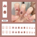 Pink translucent press-on nails with cute gingerbread and cupcake patterns, model R606 - R606 Candy Snacks (R606)