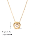 Gold titanium steel necklace featuring a circle pendant with a heart-shaped zircon stone - Gold
