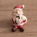 Miniature Santa Claus figurine in red and white resin holding a candy cane, 4cm height - Santa Claus