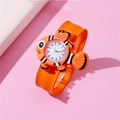 Cute orange clownfish slap watch for kids with soft silicone strap on pink background - Goldfish