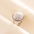 Macro shot of silver stainless steel ring featuring a round white marble pattern stone - Adjustable Open / Silver-White Stone