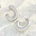 Modern chunky hollow C-shaped earrings in polished silver finish for women - White K 6052