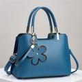 Blue large capacity faux leather handbag with lychee texture and flower charm detail - Blue
