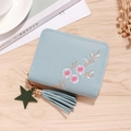 Light blue compact women's zip wallet with floral embroidery and tassel detail - Blue