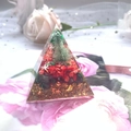 Christmas resin pyramid ornament featuring mini tree and crystals on pink background - Christmas Caterpillar Sequins