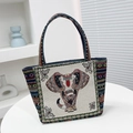 Ethnic elephant embroidery canvas handbag with colorful bohemian woven straps - Off-White Front Elephant