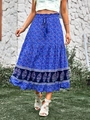 Detail of bohemian blue floral maxi skirt with elastic waist, tassels and layered hemline - S / Blue