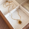 Detailed view of tiger eye stone pendant on a gold snake chain necklace with small beads - 41# Teardrop Tiger Eye Pendant Necklace