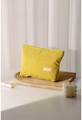 Detail showing yellow corduroy makeup bag with H & R label on a wooden tray - Yellow