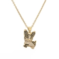 Minimalist gold plated necklace featuring a cute French Bulldog pendant with black and white stones - Gold French Bulldog