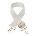 Detail of adjustable beige woven shoulder strap with geometric texture and gold metal hardware - Gold Buckle / White