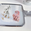 Mini acetate hair claw clip featuring a pink marble pattern and smooth resin finish - Sakura Pink