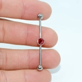 G23 titanium industrial barbell piercing with red zircon stone and silver metal finish - Red Flat Zirconia