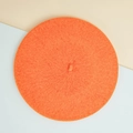 Bright orange knit beret hat with fine wool texture shown on a flat dual-color background - M / Orange
