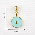 Detail view of light blue enamel star pendant measuring 2.7cm by 1.4cm with gold trim - Blue Star Enamel Pendant