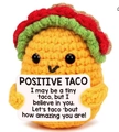 Handmade crochet positive taco plush doll holding a motivational card on white background - Taco