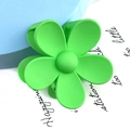 Macro shot of large matte neon green flower hair claw clip for elegant hairstyles - Large Flower Style / Fruit Green