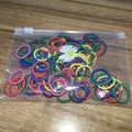 Bulk colorful elastic hair ties in a transparent pouch on a wooden surface detail - 4# Dark Color 2cm Dot Rings 100Pcs Daisy Bag