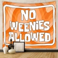 Detail view of orange tapestry with No Weenies Allowed text in a modern room setting - Orange Swirl