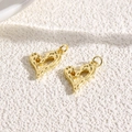 Macro detail of 18k gold plated hollow heart pendants with hammered metal texture - Golden Polished Thick Heart (ZYN-DMK776G)