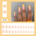Medium square false nails with light pink base and irregular yellow flame patterns - Yellow Stripes (W189)