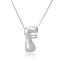 Detailed view of silver puffed letter F pendant with polished box chain and mirror reflection - Letter F