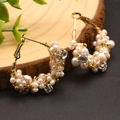 Detail of handmade gold hoop earrings with white pearls and sparkling crystals - White Simple Style Hoop Earrings