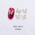 Detail of 8x8mm gold metal 3D butterfly nail charms with AB crystals and red nail art sample - Gold Aurora Diamond Butterfly (8818)