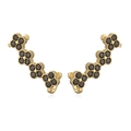 Detailed macro view of gold-plated clover ear climbers with black crystal inlay - Gold Black Zirconia