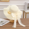 Elegant beige straw sun hat featuring lace trim and a large chiffon bow decoration - Side Flower Style - Creamy White