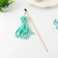 Plush green octopus cat wand toy with wooden handle and blue cartoon eyes - Octopus / Green