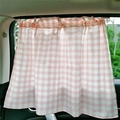 Pink and white gingham car window sunshade curtain for babies in a car interior setting - Light Pink Large Gingham