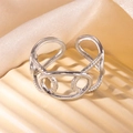 Silver wide open ring with interlinked smooth and rope textured oval links in titanium steel - Steel Color 143