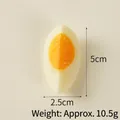 Realistic PVC boiled egg food model keychain charm with orange yolk, 5cm size - 1/4 Soft-boiled Egg - No Ring