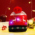 Knitted Christmas hat with LED lights featuring reindeer and snowflake patterns - Red Double Reindeer