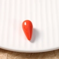 Detail of teardrop resin bead in orange-red with polished smooth coral texture - 1 Piece / Orange