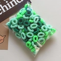 Lot d'élastiques à cheveux en peluche verte dans un sac transparent pour filles - Chouchous à Fleurs Verts